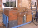 Trunks on a trolley outside the exhibition room