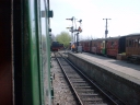 Looking out from the diesel train to see the steam loco coming