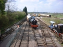 Watching the steam train from the passenger bridge