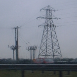 M5, UK: Cables are transferred from pylon to poles before crossing the motorway [Picture by Flash Wilson]