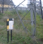 Stratford, UK: Pylon YYJ18 by sign about the riverside [Picture by Flash Wilson]