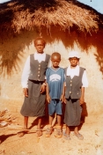 Photo of Sekou and his sisters in 2002