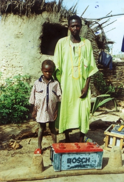 Photo of Sekou and his father in 2000
